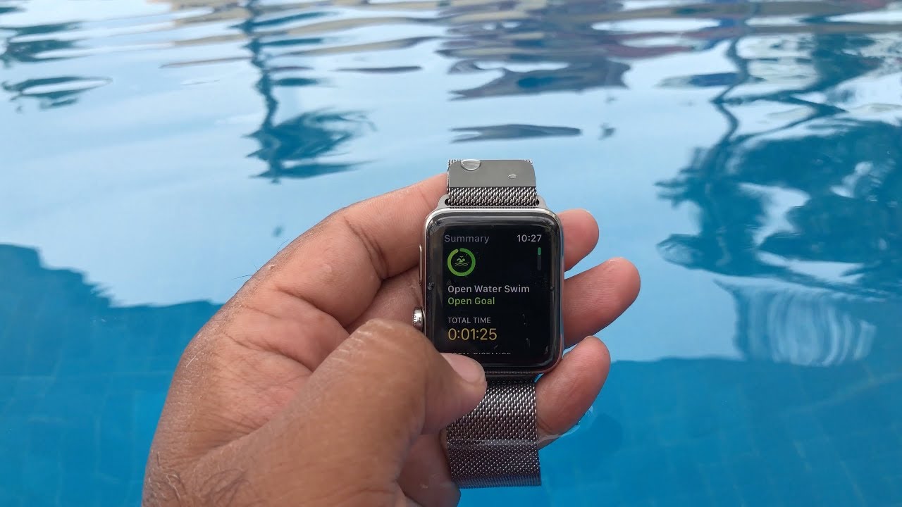 After swimming, how do you get the water out of your Apple Watch? 